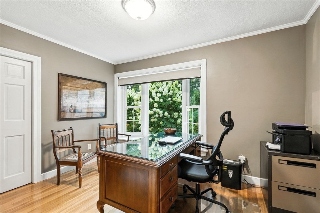 52 Wenham Road Topsfield, MA 01983 - Photo 15 of 42 a view of a workspace with furniture and a window