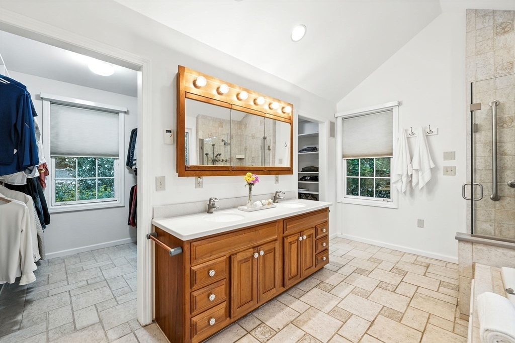 52 Wenham Road Topsfield, MA 01983 - Photo 22 of 42 a bathroom with a sink vanity granite tub shower and mirror