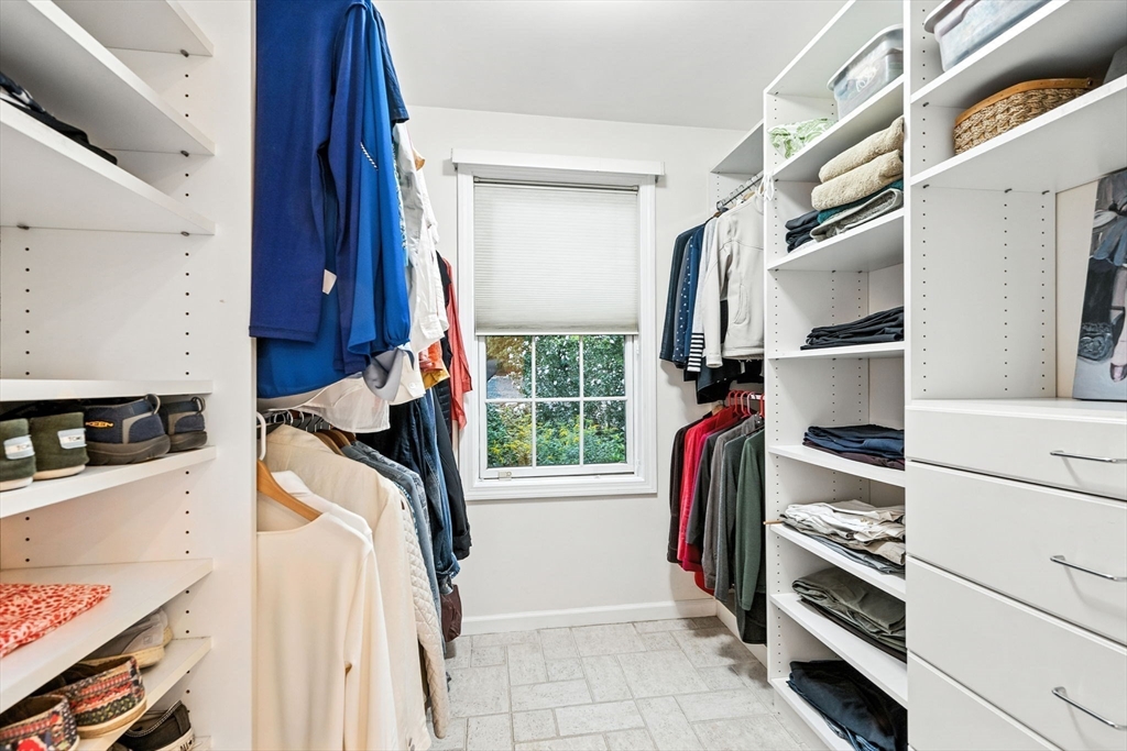 52 Wenham Road Topsfield, MA 01983 - Photo 23 of 42 a view of walk in closet with clothes and shoes