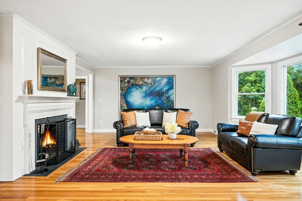 52 Wenham Road Topsfield, MA 01983 - Photo 4 of 42 a living room with furniture and a fireplace
