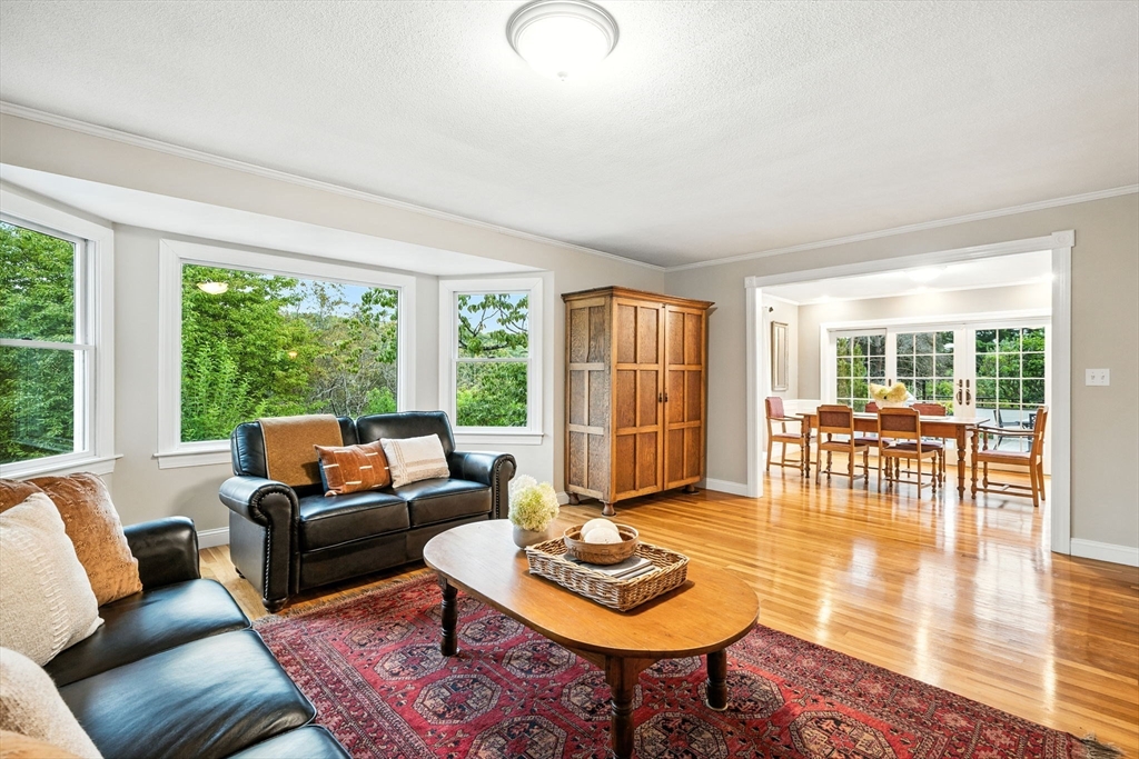52 Wenham Road Topsfield, MA 01983 - Photo 6 of 42 a living room with furniture and a large window