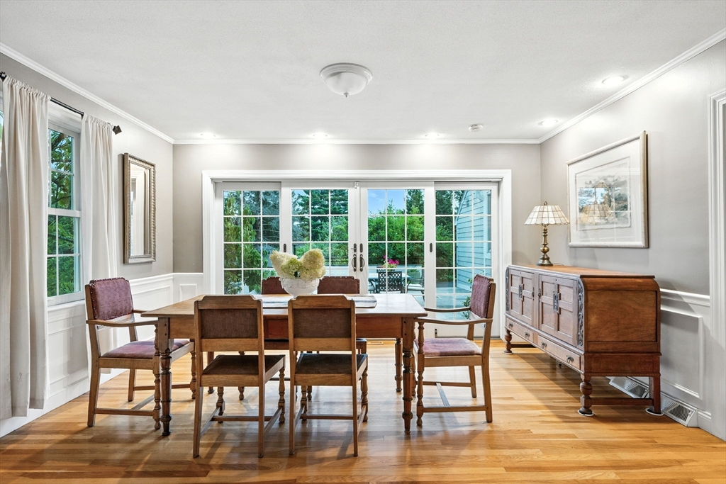 52 Wenham Road Topsfield, MA 01983 - Photo 8 of 42 a view of a dining room with furniture window and wooden floor