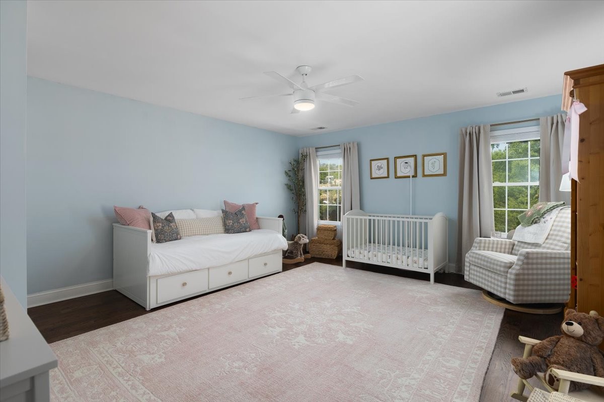 175 B Rural Avenue Nashville, TN 37209 - Photo 21 of 26 a bedroom with a bed and a couch