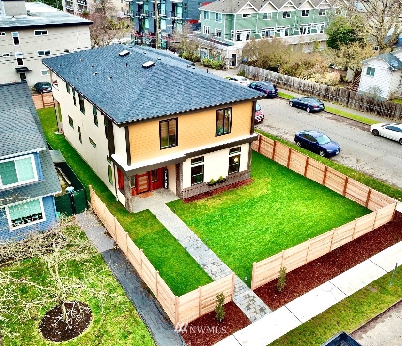5603 42nd Avenue Southwest Seattle, WA 98136 - Photo 1 of 40 a aerial view of a house with swimming pool