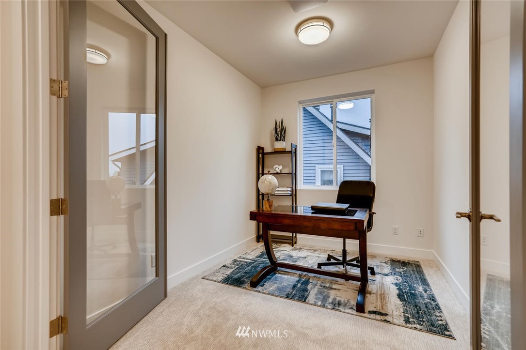 5603 42nd Avenue Southwest Seattle, WA 98136 - Photo 31 of 40 a sitting area with furniture and a window