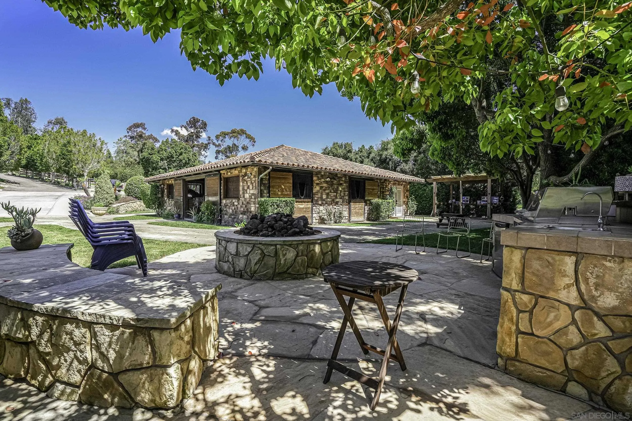 5305 La Crescenta Road Rancho Santa Fe, CA 92067 - Photo 13 of 63 Fantastic space down at the barn including the covered cross tie/wash racks