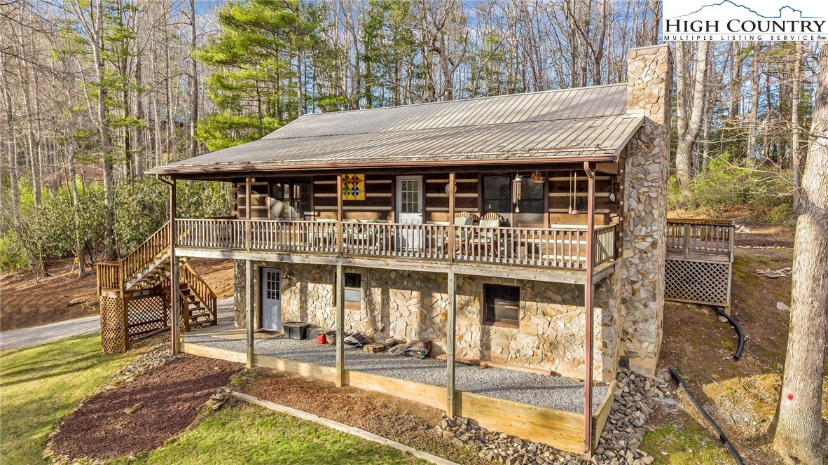 a front view of a house with a porch
