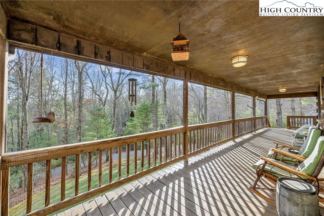 214 Deer Ridge Road Crumpler, NC 28617 - Photo 17 of 44 a view of a balcony with furniture