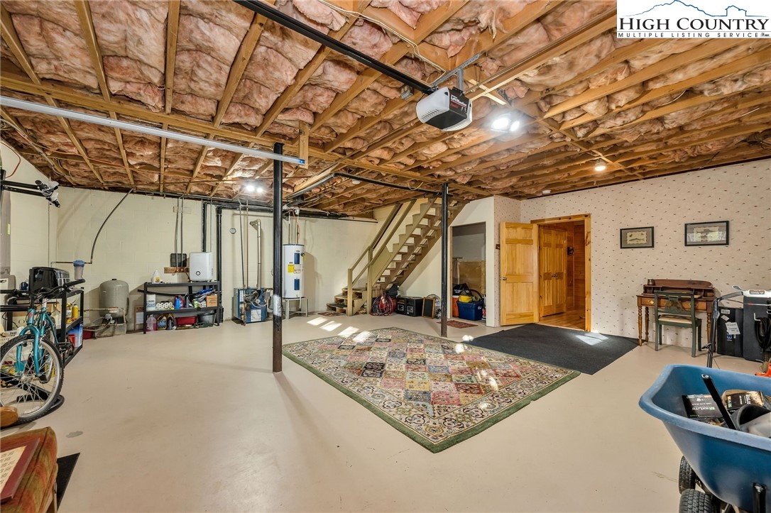 214 Deer Ridge Road Crumpler, NC 28617 - Photo 27 of 44 a view of a room with gym equipment