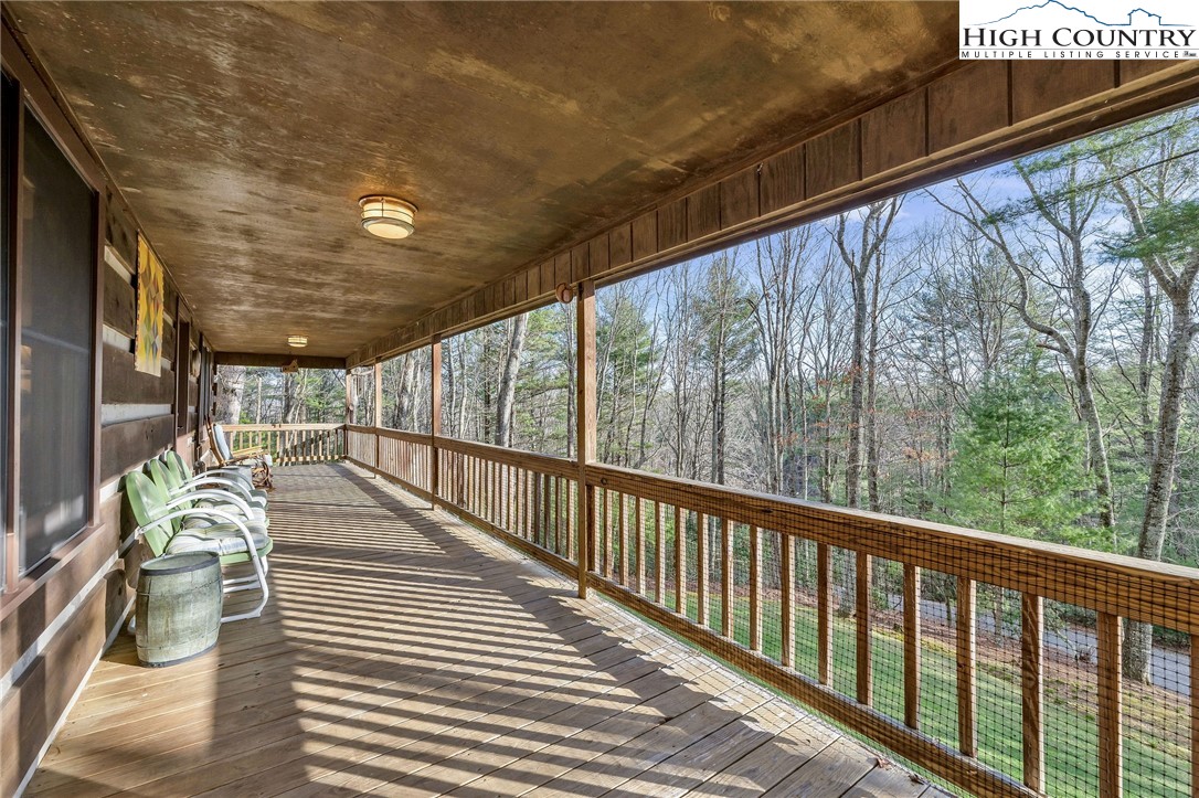 214 Deer Ridge Road Crumpler, NC 28617 - Photo 34 of 44 a view of balcony with couch