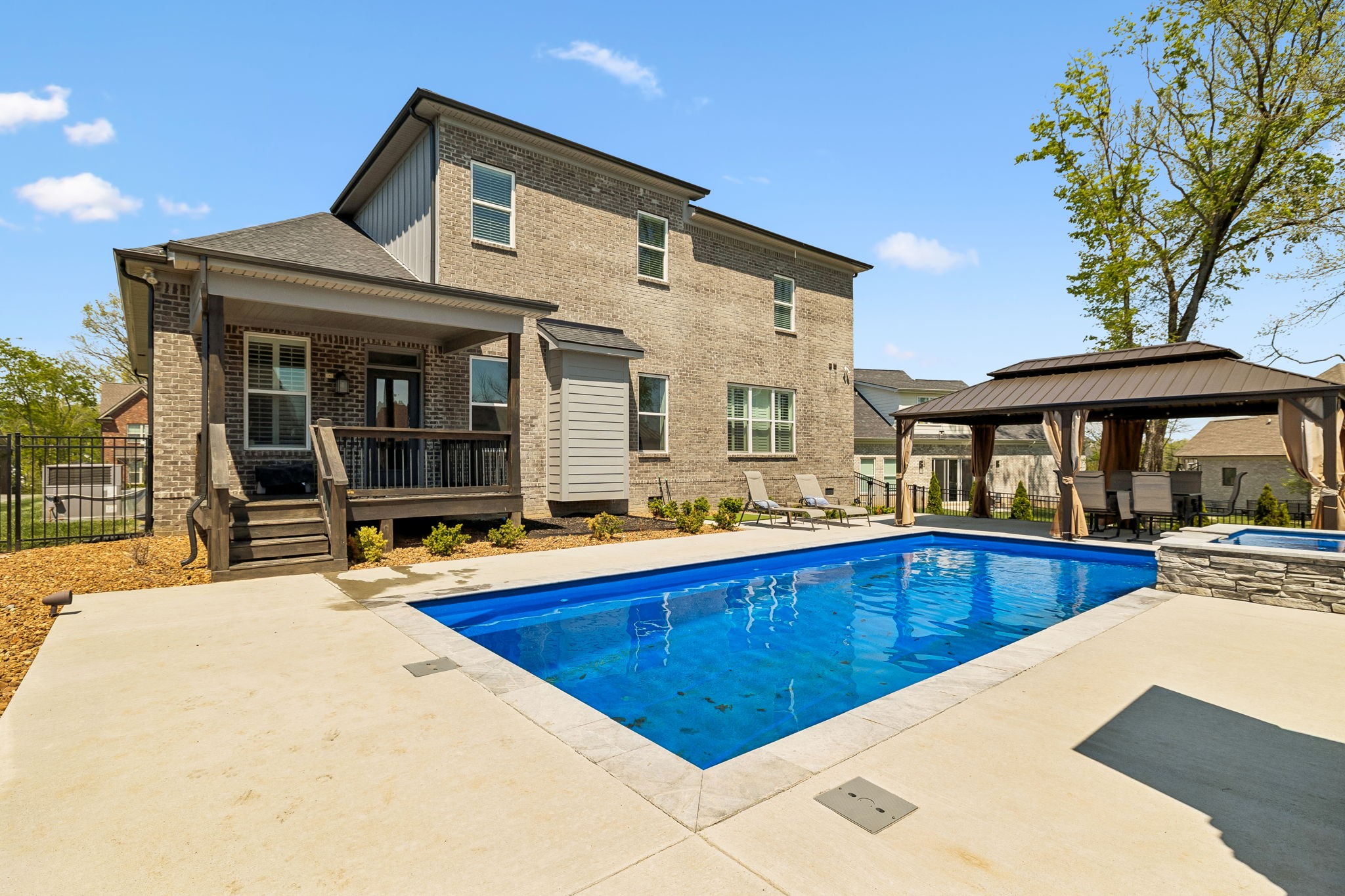 1008 Quillen Way Lebanon, TN 37087 - Photo 1 of 54 a view of a house with pool and chairs