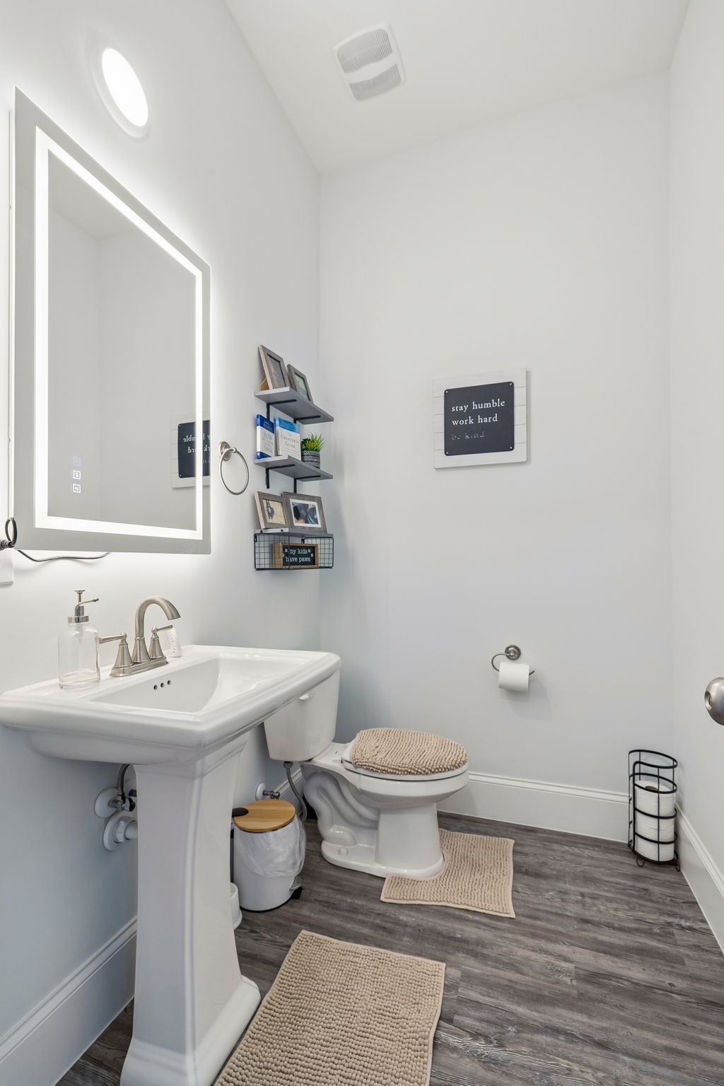 1008 Quillen Way Lebanon, TN 37087 - Photo 27 of 54 a bathroom with a toilet sink and mirror