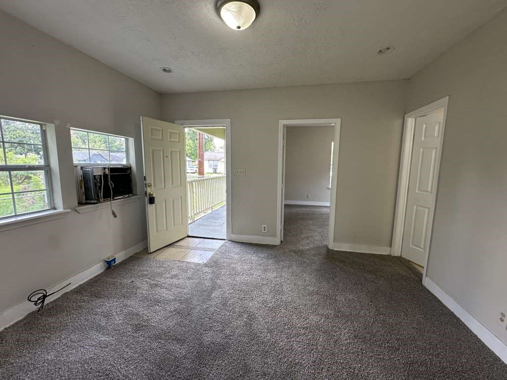 4520 Falls Street Houston, TX 77026 - Photo 5 of 11 an empty room with windows