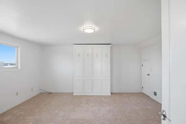 an empty room with windows