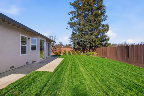a house view with a garden space