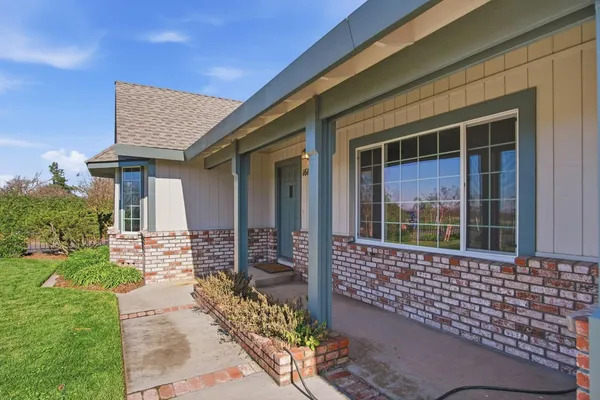 a front view of a house with a porch