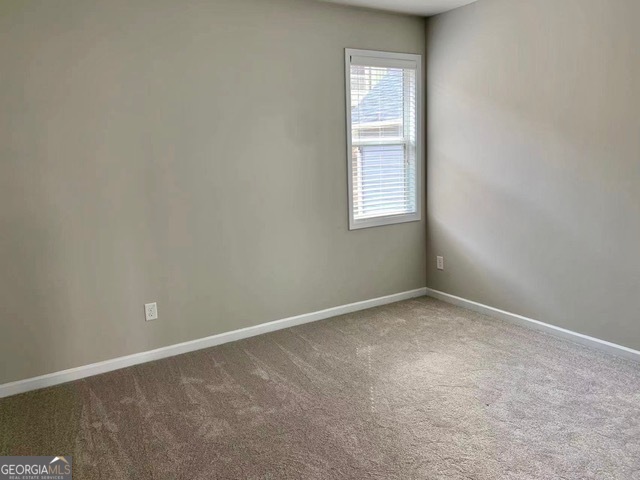 177 Dunleith Parkway Southwest Marietta, GA 30008 - Photo 14 of 17 an empty room with windows