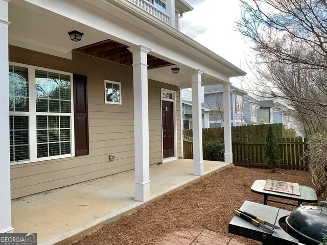 a view of a balcony with chair