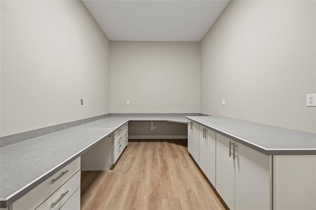 10409 Countryside Drive Denton, TX 76207 - Photo 31 of 38 Unfurnished office with built in study area and light wood finished floors