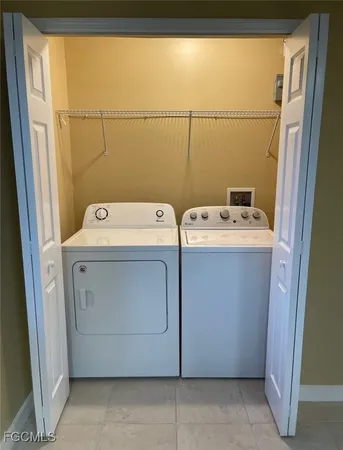a bathroom with a sink a toilet a mirror and vanity