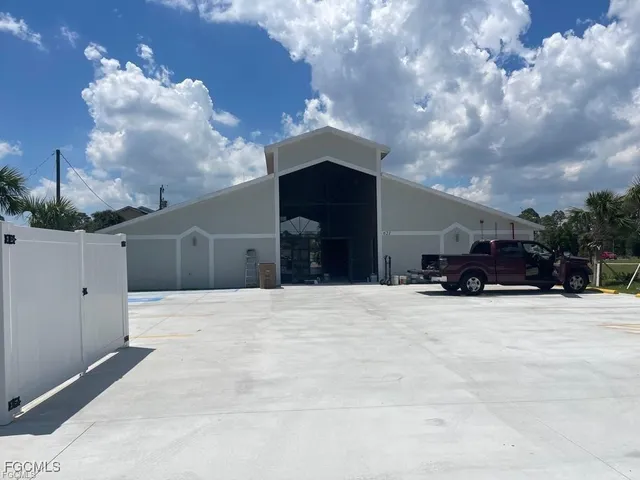 a view of a house with a snow in front of house