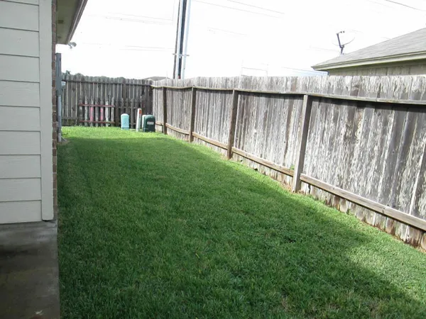 a view of a backyard with a garden