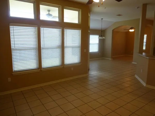 a view of an empty room and window