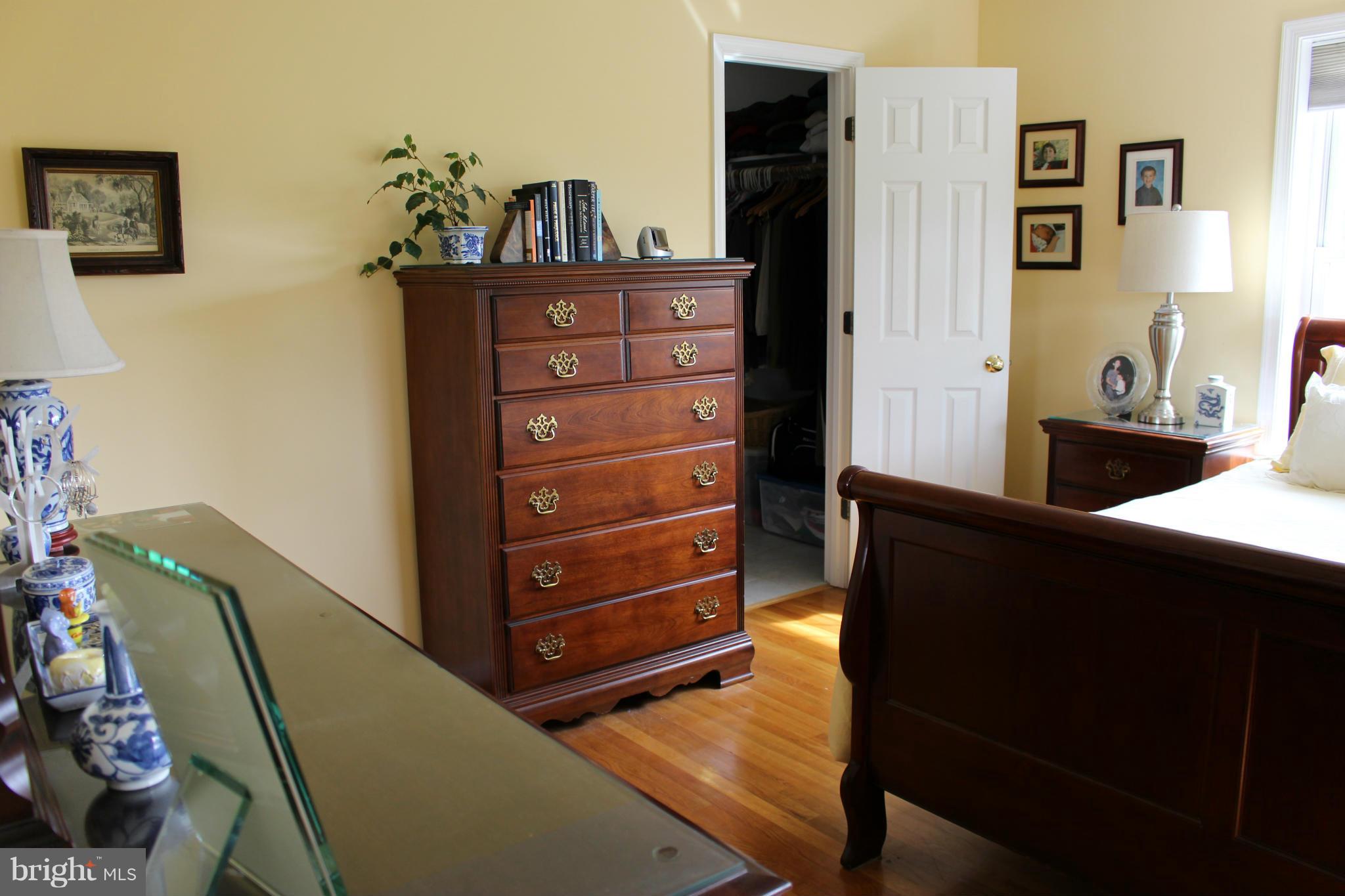 245 Milldale Road Front Royal, VA 22630 - Photo 17 of 29 a bed room with a bed and a dresser