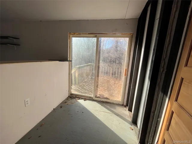 a view of a room with an empty space