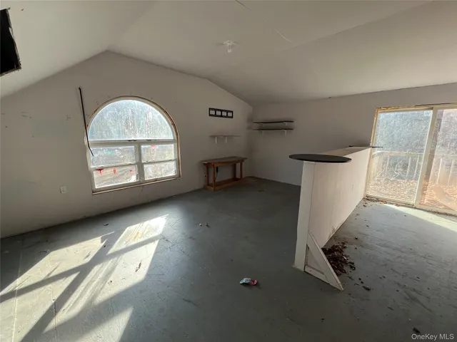 an empty room with windows