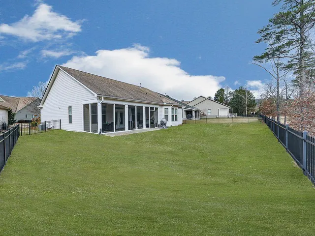 a view of a studio with wooden floor