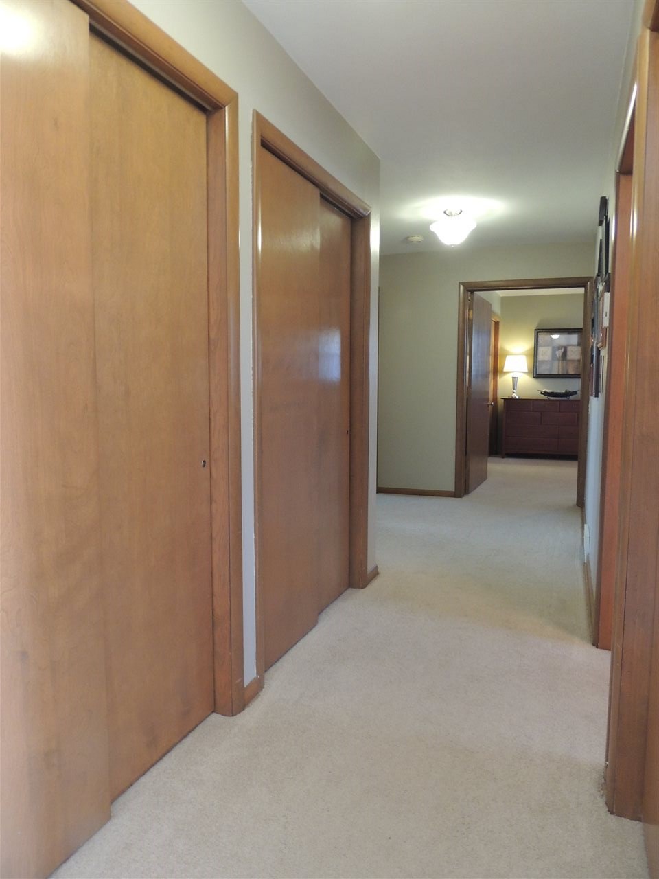 4114 Cushman Road Rockford, IL 61114 - Photo 12 of 25 a view of a hallway with wooden floor