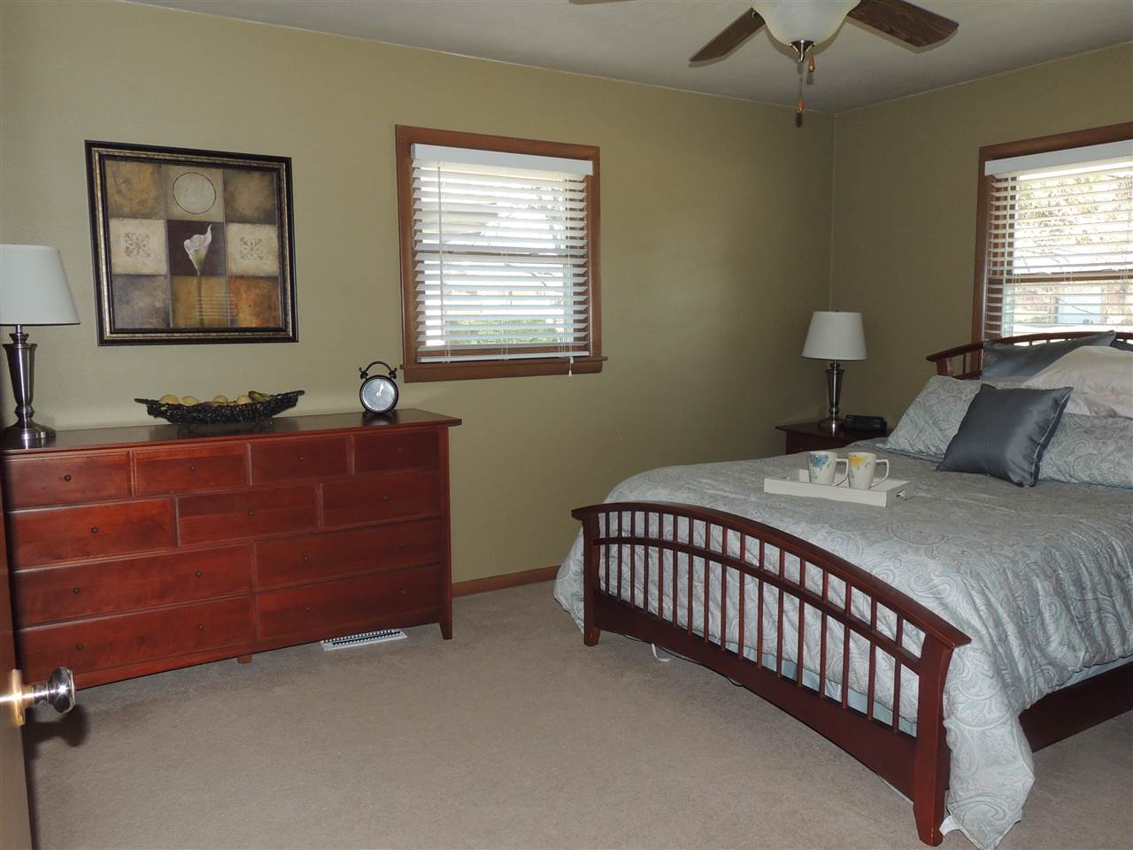 4114 Cushman Road Rockford, IL 61114 - Photo 13 of 25 a bedroom with a bed and a window