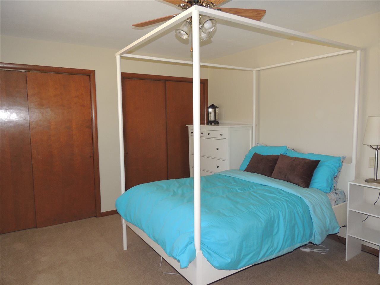 4114 Cushman Road Rockford, IL 61114 - Photo 17 of 25 a bedroom with a bed and a closet