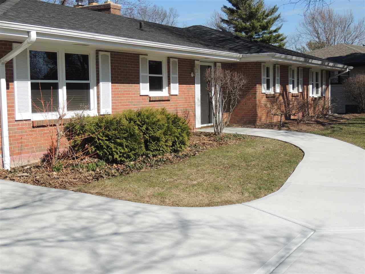 4114 Cushman Road Rockford, IL 61114 - Photo 2 of 25 a view of a house with backyard porch and sitting area