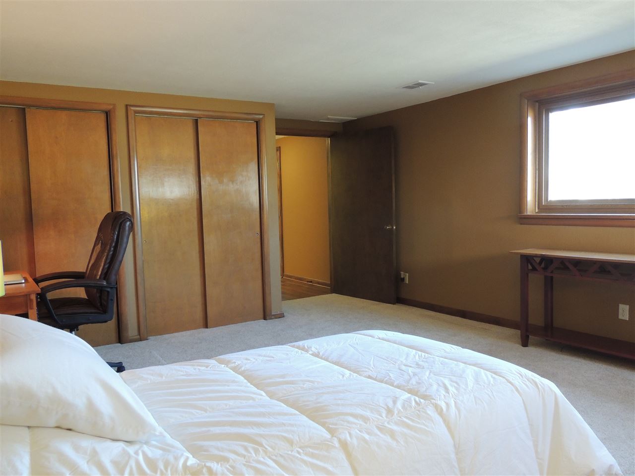 4114 Cushman Road Rockford, IL 61114 - Photo 25 of 25 a bedroom with a bed and a window