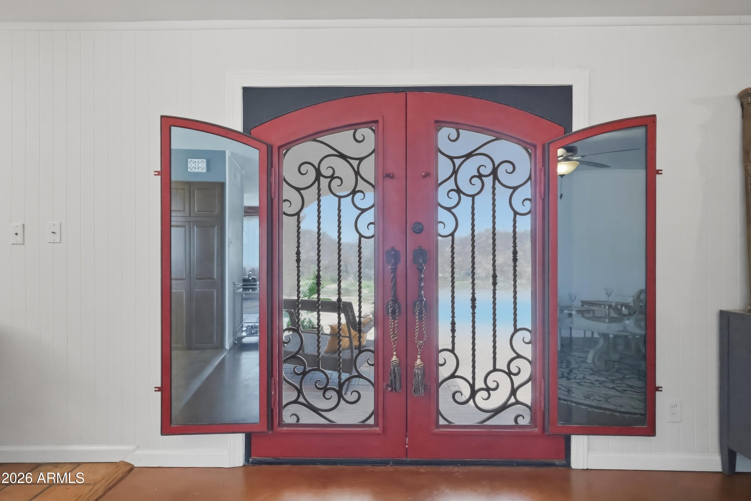 2302 West Berridge Lane Phoenix, AZ 85015 - Photo 22 of 59 Family Room Iron Doors with Glass Open
