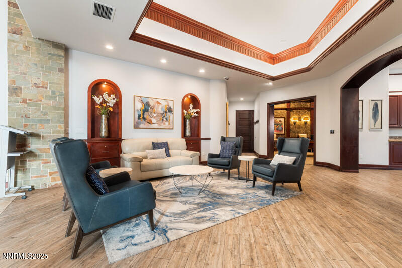 900 South Meadows Parkway, Unit 3322 Reno, NV 89521 - Photo 25 of 35 a living room with furniture and wooden floor