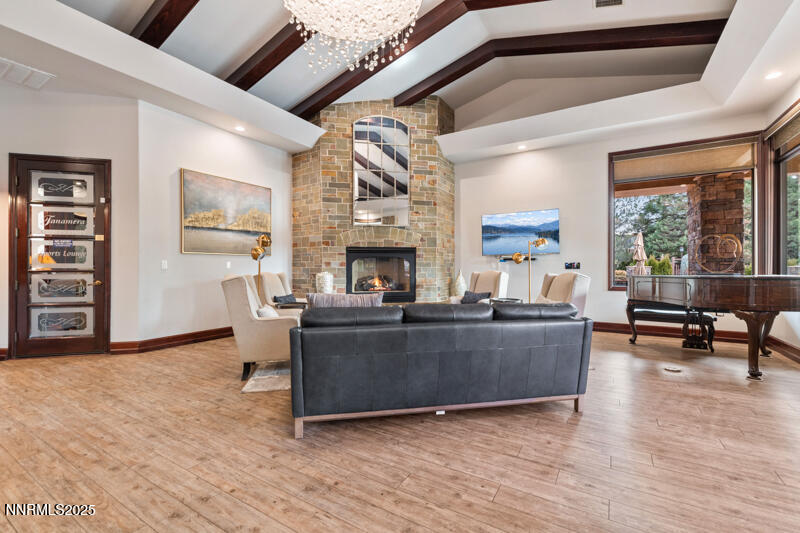 900 South Meadows Parkway, Unit 3322 Reno, NV 89521 - Photo 28 of 35 a living room with furniture and a fireplace