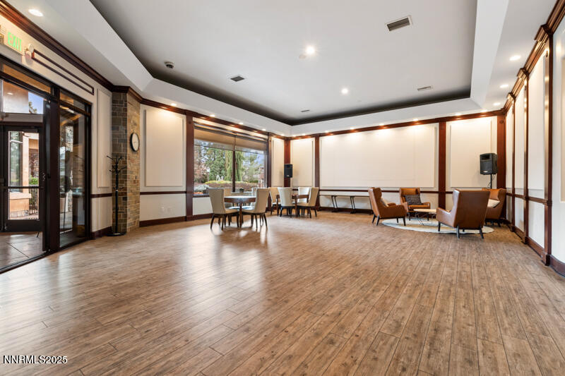 900 South Meadows Parkway, Unit 3322 Reno, NV 89521 - Photo 30 of 35 a view of an empty room with large windows and furniture