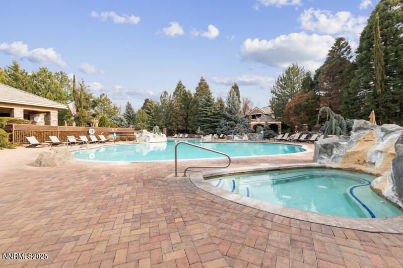 900 South Meadows Parkway, Unit 3322 Reno, NV 89521 - Photo 34 of 35 a view of a swimming pool with a yard