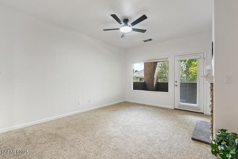 900 South Meadows Parkway, Unit 3322 Reno, NV 89521 - Photo 4 of 35 an empty room with windows