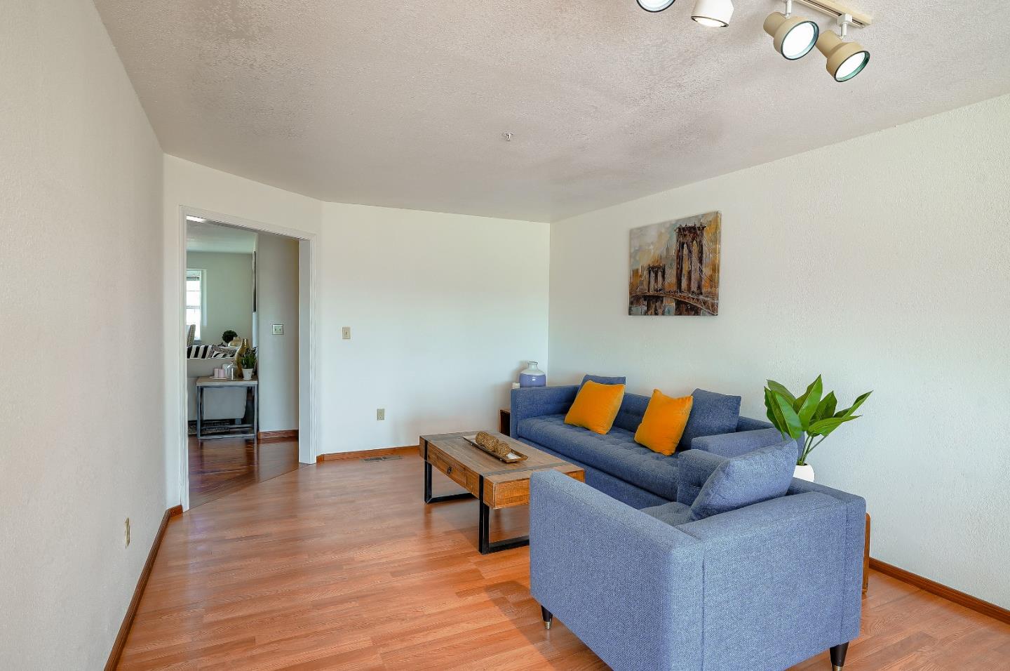 2800 Roop Road Gilroy, CA 95020 - Photo 11 of 70 a living room with furniture and a wooden floor
