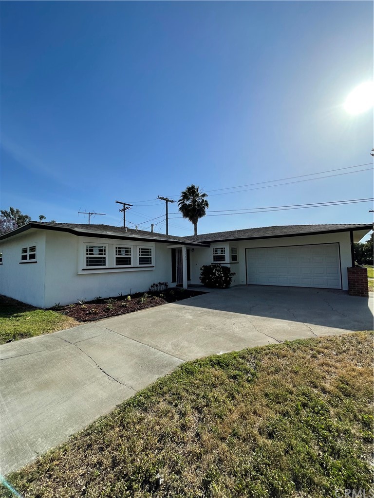 3504 Bryce Way Riverside, CA 92506 - Photo 1 of 1 a front view of a house with a yard