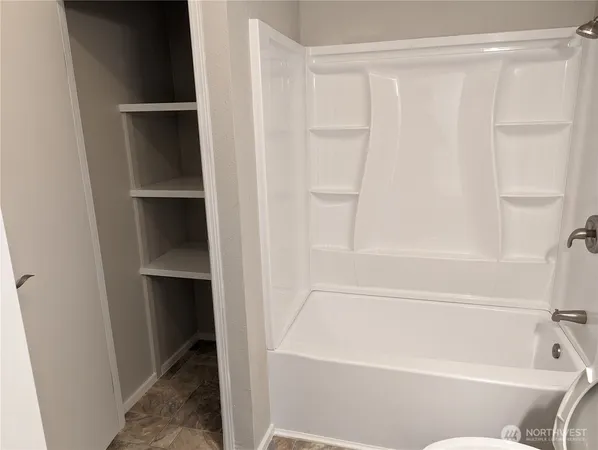 a bathroom with a bathtub