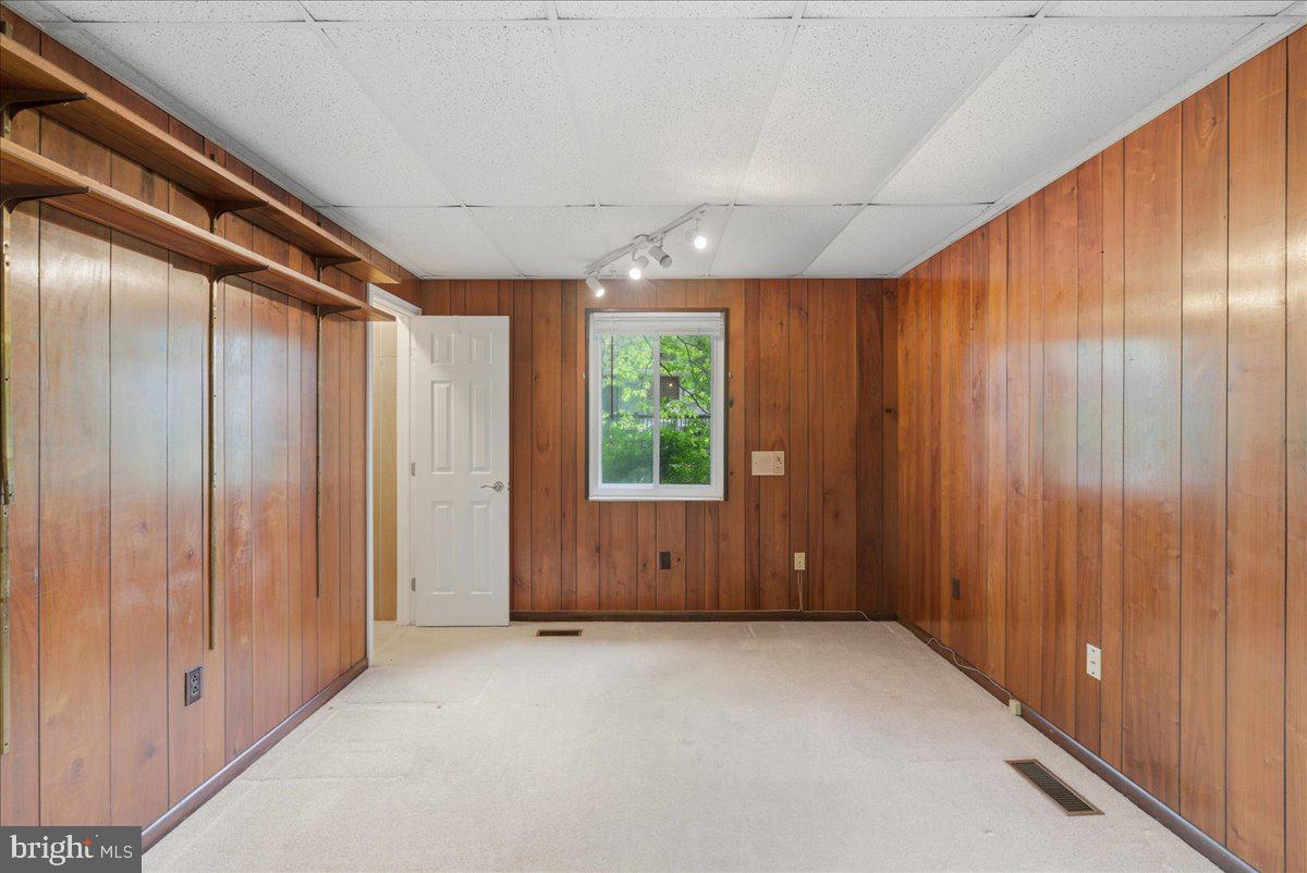 18309 Cabin Road Triangle, VA 22172 - Photo 23 of 42 a view of an empty room with a window and a balcony