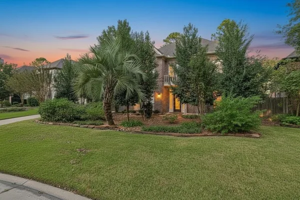 a view of a backyard with a garden