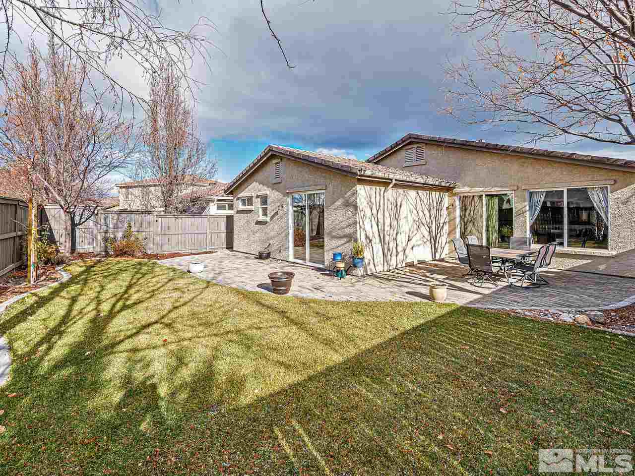 450 Alysheba Court Reno, NV 89521 - Photo 13 of 14 a view of a house with swimming pool