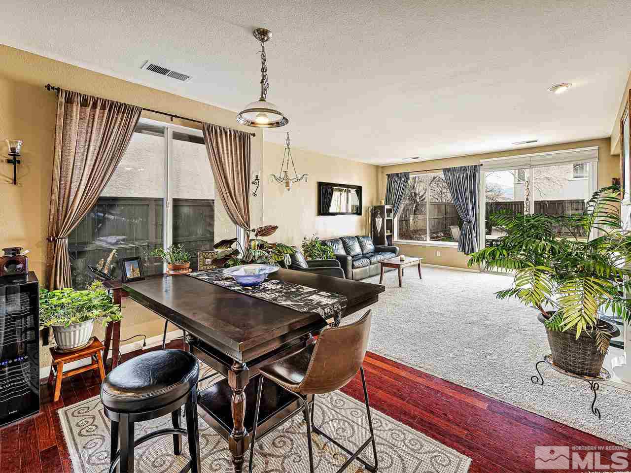 450 Alysheba Court Reno, NV 89521 - Photo 6 of 14 a dinning table and chairs in a room