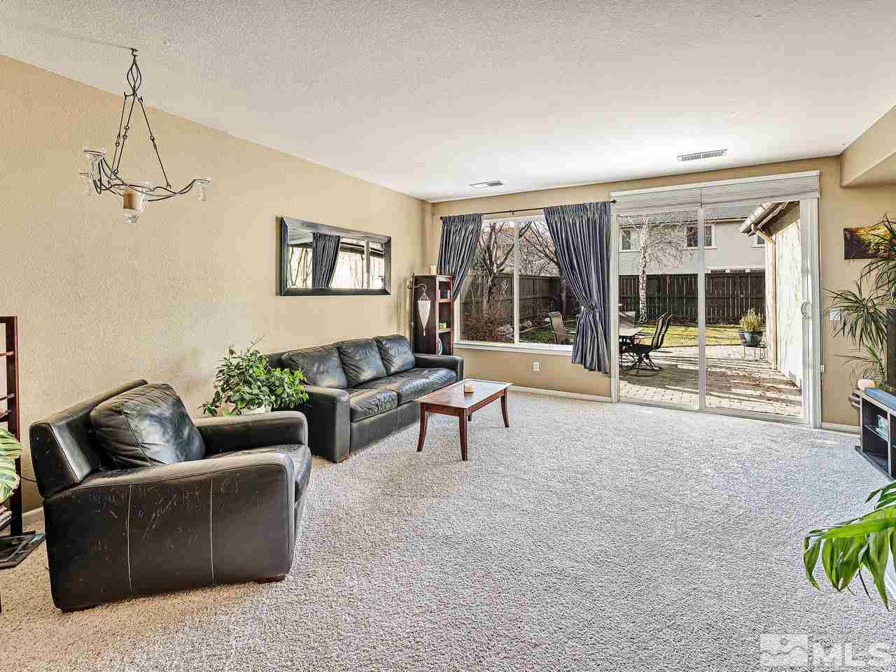 450 Alysheba Court Reno, NV 89521 - Photo 7 of 14 a living room with furniture and a window